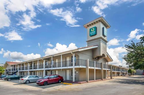 a building with a clock tower on top of it at Quality Inn & Suites North Charleston - Ashley Phosphate in Charleston