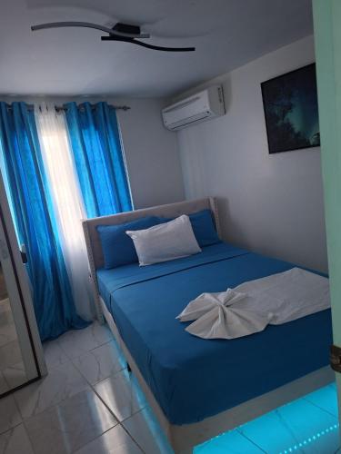 En eller flere senge i et værelse på Vacazure