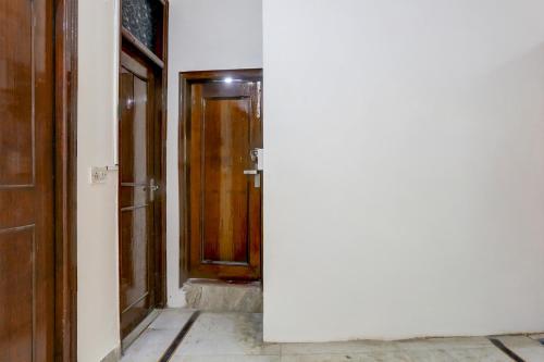 an open door to a room with an open door at Hotel O Green Park Residency 2 in New Delhi
