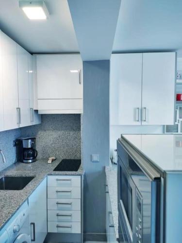 Bermudas apartamento con piscina en Benidorm