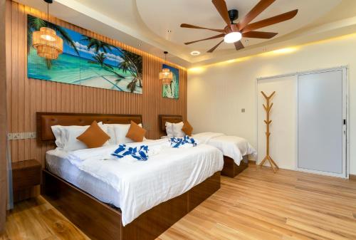 Llit o llits en una habitació de Hidden Tide Villa