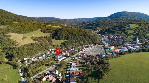 an aerial view of a village in the mountains at Apartmán Timea v Terchovej in Terchová