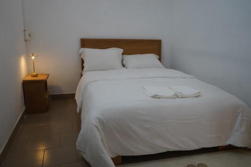 Llit o llits en una habitació de Résidence chez-moi