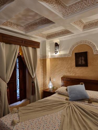 Llit o llits en una habitació de Riad Souad Marrakech
