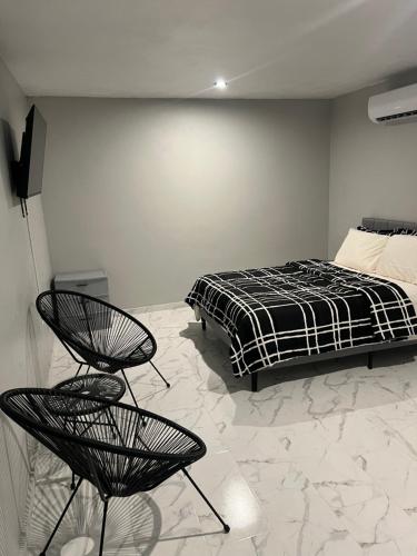 เตียงในห้องที่ Molinos House 5