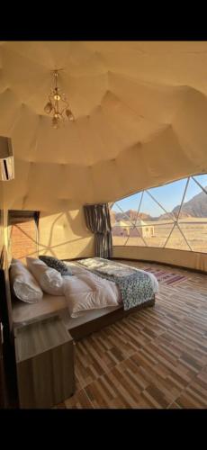 En eller flere senge i et værelse på Essam