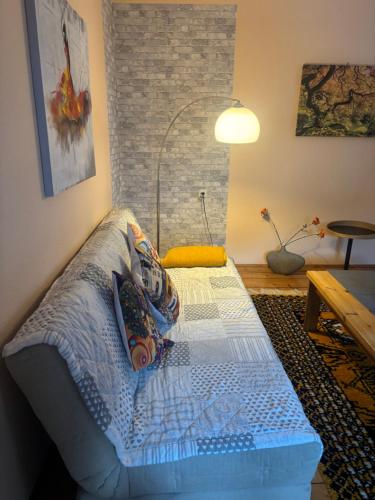 a bedroom with a bed in the corner of a room at Weichselboden, Alte Schule in Weichselboden
