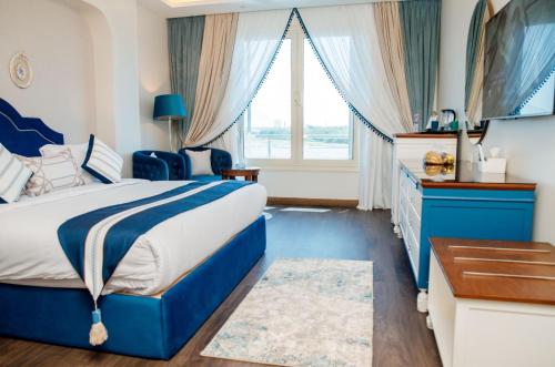 a hotel room with a bed and a window at Nile Transport Hotel in Cairo