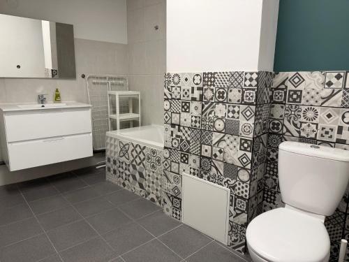 Bany a Studio en duplex