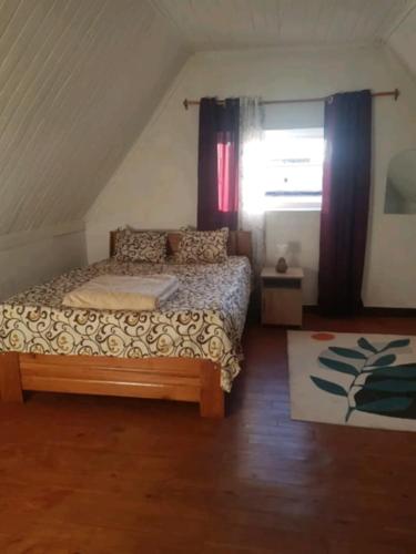 Llit o llits en una habitació de appartantsirabe