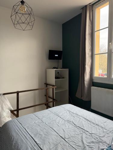 Llit o llits en una habitació de Studio en duplex