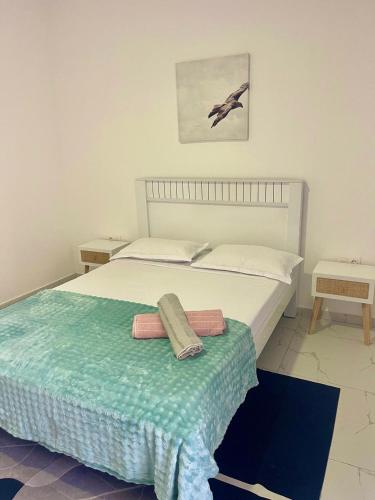 En eller flere senge i et værelse på Encanto do Mar