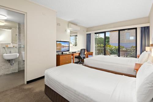 Postel nebo postele na pokoji v ubytování ibis Styles Port Macquarie
