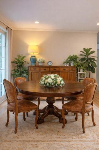 a dining room with a wooden table and chairs at Northern Stay in North Vancouver