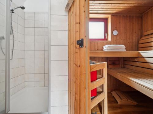 a bathroom with a shower and a bath tub at Kaffeemühle Hamma II in Heringen