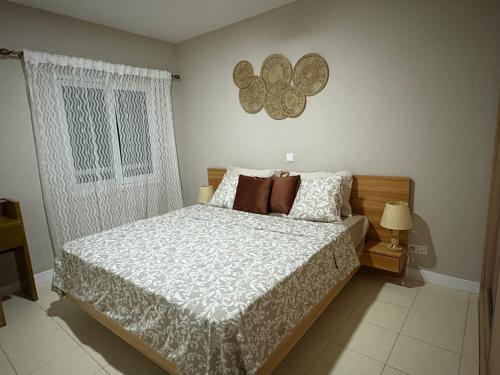 Llit o llits en una habitació de Realeza