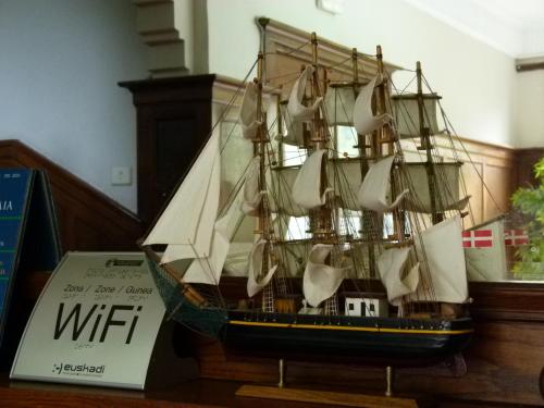 a model of a pirate ship on a table at Hotel Neguri in Getxo
