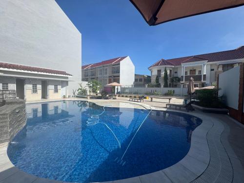 Piscina a Divita Residence o a prop