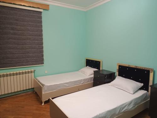 Llit o llits en una habitació de SHER e PUNJAB HOSTEL