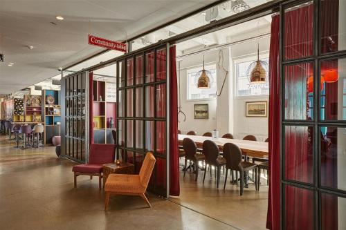 a dining room with a table and chairs at Reykjavik Marina - Berjaya Iceland Hotels in Reykjavík