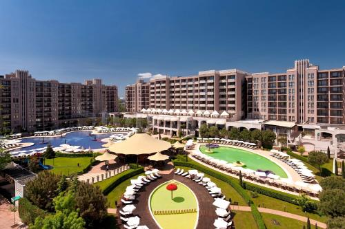 an aerial view of a resort with a pool and buildings at ROYAL BEACH HOTEL apartment in Sunny Beach