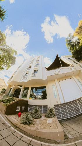 a building with a lot of windows and plants at Hotel Buena Vista in Bucaramanga