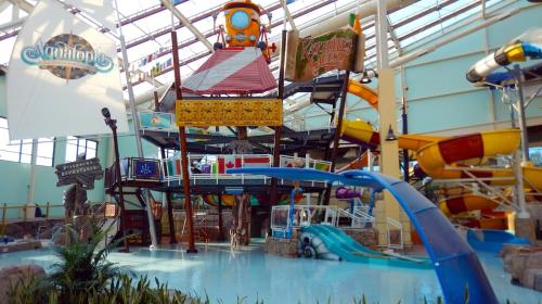 a large indoor water park with a roller coaster at Moonlight Mountain Lodge on Camelback Mountain! in Tannersville
