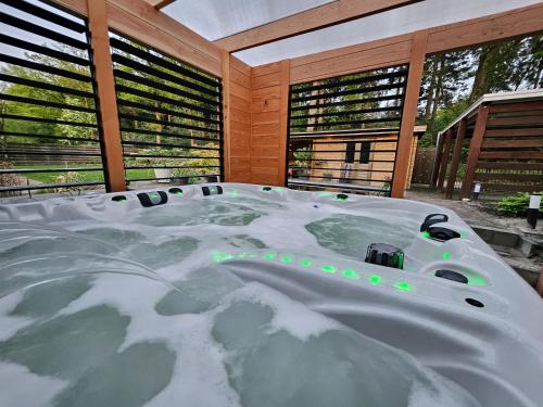 a large bath tub in a room with snow on it at Artz of Nature in Emmen