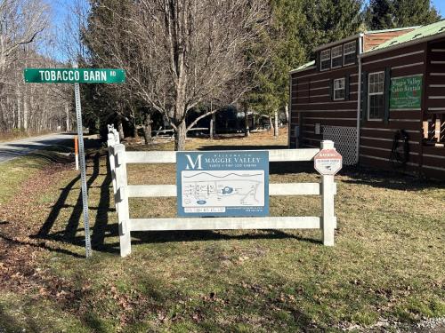 a sign for a visitor center on the side of a road at Maggie Valley Cabin Rentals in Maggie Valley