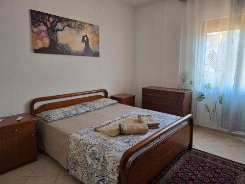 Postel nebo postele na pokoji v ubytování Erid Apartment
