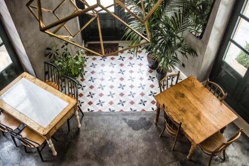 an overhead view of a dining room with tables and chairs at City Circus Athens in Athens