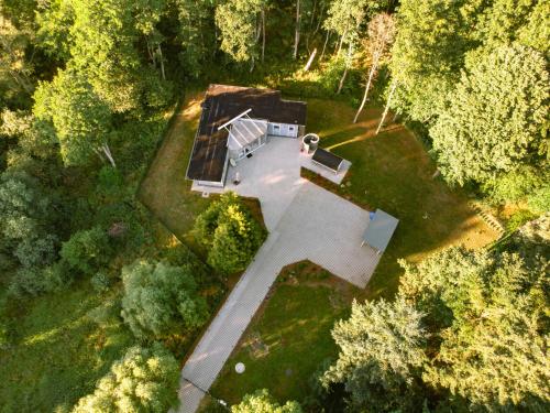 an overhead view of a house in the middle of a forest at Bienenhaus in Sassnitz