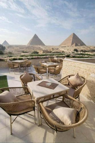 El Nabila Front Pyramids & Sphinx View