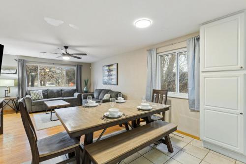 a dining room and living room with a table and chairs at Pet Friendly near Garden of the Gods AF Academy in Colorado Springs