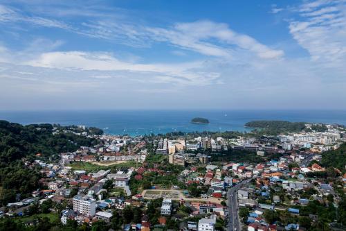 an aerial view of a city and the ocean at ELEGANT Kata sea View Apartmens in Kata Beach