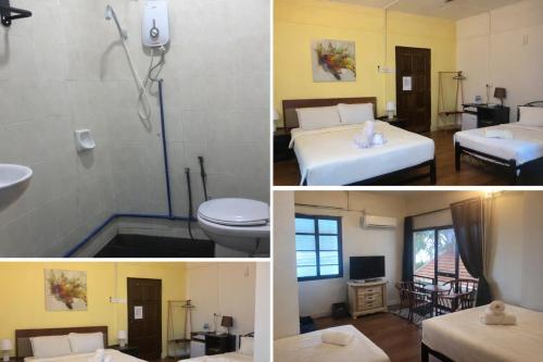 a hotel room with a shower toilet and a sink at Northern Cove Penang in Tanjung Bungah
