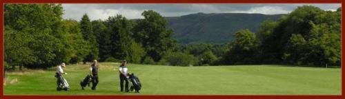a group of people riding horses in a field at Kirklands Hotel in Kinross