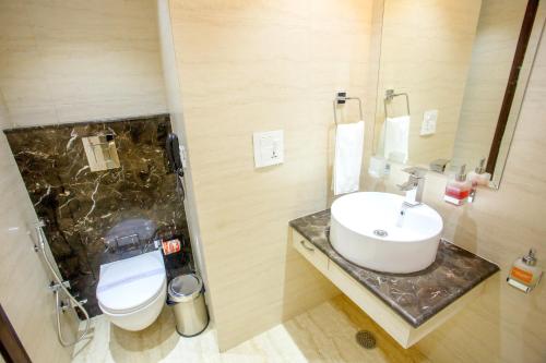 Ванная комната в Hotel Tara Palace Daryaganj