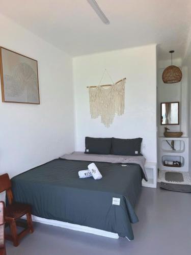 a bedroom with a large bed in a room at Windy Villa Phú Quý in Cù Lao Thu