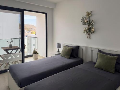 Krevet ili kreveti u jedinici u okviru objekta Spacious 2 bdr aprt, rooftop pool - LCGR