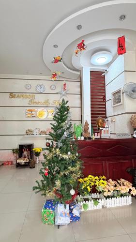a christmas tree in the middle of a room at Lucky Minh An in Nha Trang