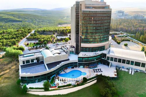 an aerial view of a hotel with a pool at BİG THERMAL Spa Resort in Kalankaldı