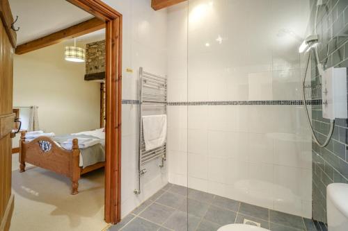 a bathroom with a shower and a sink at 3 Bed in Ingleton oc-l34471 in Ingleton