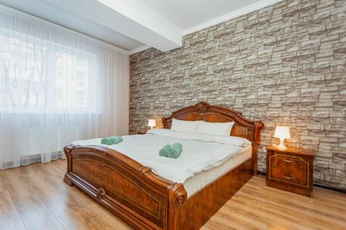 Un pat sau paturi într-o cameră la Apartmentrent