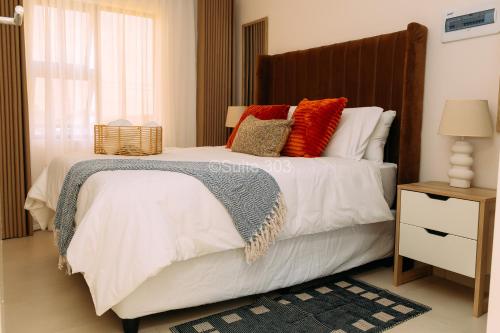 Llit o llits en una habitació de Suite 303