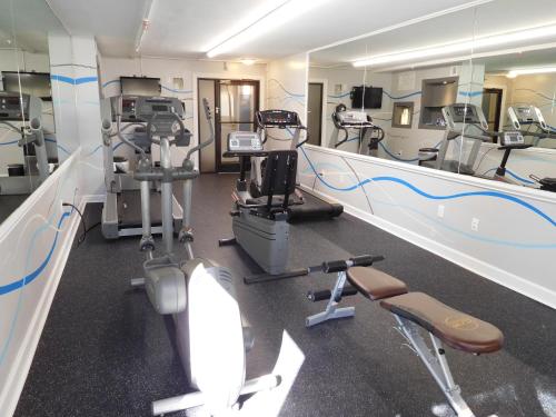 a dental room with several treadmills and machines at Wyndham Garden Greensboro in Greensboro