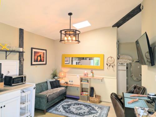 a living room with a couch and a table at Early Birds in Tucson