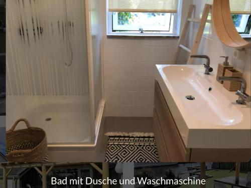 a bathroom with a tub and a sink and a shower at Park De Markol River House in Lemmer
