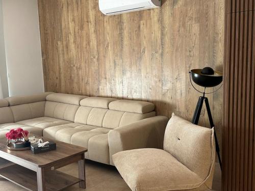 a living room with a couch and a table at CityLink-3Bedrooms Appartment CityCenter in Limassol