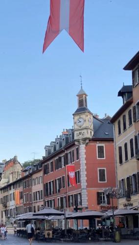a building with a clock tower on top of it at City centre appartement en colocation in Chambéry